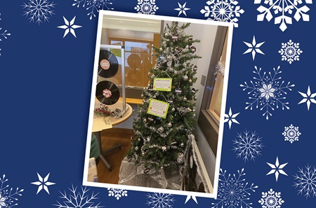 A Christmas tree strung with vinyl records